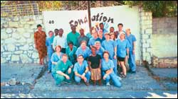 Posing for their photo are the 2003 Minnesota Healing Hands team, along with the clinic staff and administration.