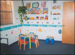 The LeapFrog Learning Table (right) is the perfect height to evaluate patients age nine months-two and a half years in double support stance, while children ages three-seven are seen at the larger table and chairs (left). An assortment of 
