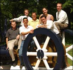Pictured on a vintage locomotive-a historical reminder of the many engineering feats and contributions to the world by Georgia Tech-are the members of the first MSPO graduating class and their instructors. Front row, from left are: Benjamin Lucas; Alejandro Aviles; and Christopher Hovorka, CPO, program clinical director. Back row, from left are Robert Kistenberg, CPO, FAAOP, clinical director of prosthetics; Mark Holowka; Kristin Andrews; and David Fritz.