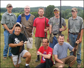 During a break in the trash talk, the shooters pose for a picture. Photograph courtesy of the Upper Extremity National Outreach Coalition.