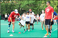 Bik assists at a Challenged Athletes Foundation clinic.