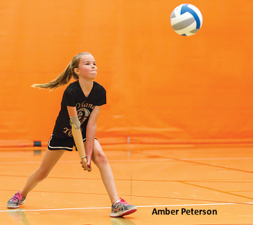 Amber hitting volleyball