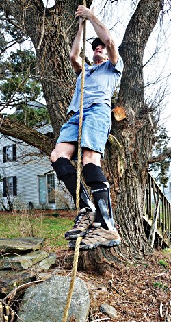 Stevens displaying rope climbing skills