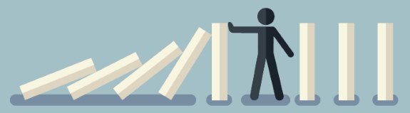 graphic of figure stopping falling dominoes