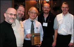 Dr. Yeongchi Wu receives the Lifetime Achievement Award. From left: Kevin Carroll, CP; Ivan Sabel, CPO; Dr. Wu; Jack Uellendahl, CPO; and Mike Brncick, CPO. Photos courtesy of Hanger Prosthetics & Orthotics, Inc.