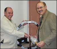 Left: Nick Taylor  and Snell Prosthetic & Orthotic Laboratory General Manager Rick Fleetwood. 