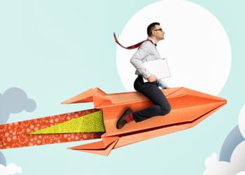 A businessman with a laptop flies on a paper space rocket in a puff of smoke.